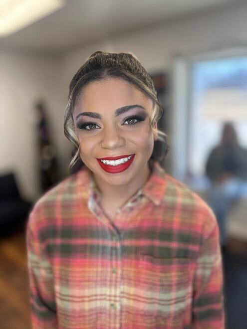 Full glam makeup with a bold red lip